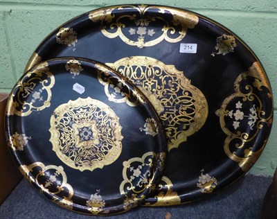 Lot 214 - Two graduated Victorian papier mache oval trays with gilt decoration made by Jennens &...