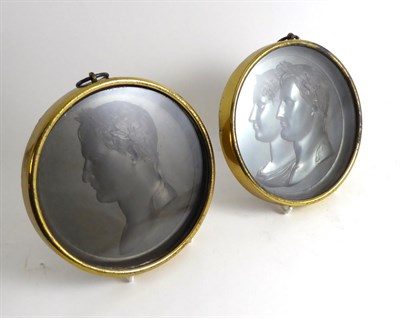 Lot 228 - After Andrieu, a pair of bronze medallions cast with brass relief portrait of Napoleon and Napoleon