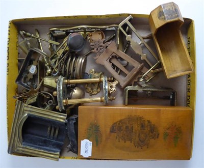 Lot 242 - Assorted miniature brass hearth items, carved easel, mauchlineware hinged box and cradle etc