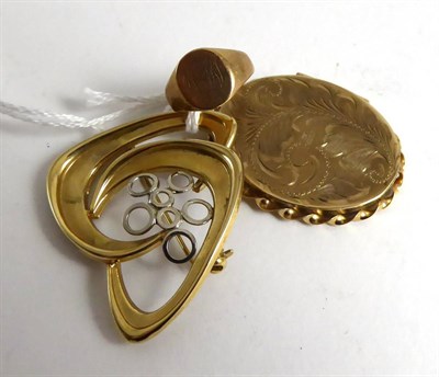 Lot 260 - A 9ct signet ring, abstract brooch and 9ct locket (3)