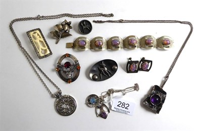 Lot 282 - Three gem set pendants, three Danish brooches, a Scottish brooch, Mexican bracelet and earring set