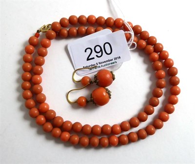 Lot 290 - A pair of coral drop earrings and a simulated coral necklace