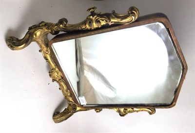 Lot 309 - Rococo style toilet mirror with tooled leather frame