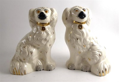 Lot 328 - A pair of Beswick seated spaniels   Provenance: By repute Trawsgoed Mansion