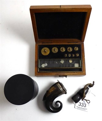 Lot 333 - A Scottish horn snuff mull, horn whistle, small weights (cased) and a glass tube inscribed drops