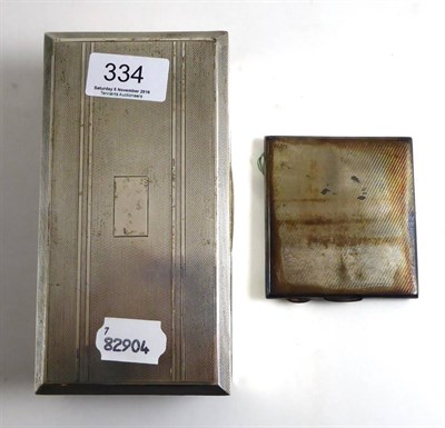 Lot 334 - A silver cigarette box and a silver cigarette case