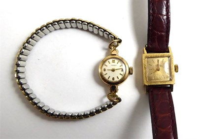 Lot 362 - A Bucherer ladies wristwatch, the case stamped 18k together with a 9ct gold cased ladies Tissot...