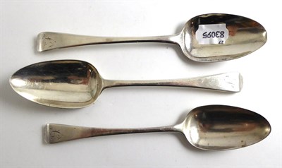 Lot 369 - Three George III silver serving spoons