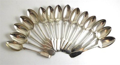 Lot 371 - A harlequin set of eleven silver dessert spoons mostly by Josiah Williams &amp; Co., Exeter...