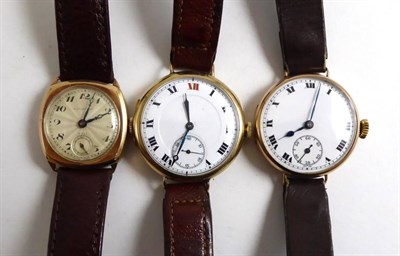 Lot 375 - Three 9ct gold wristwatches, two with enamel dials and an engine turned silvered dial signed...