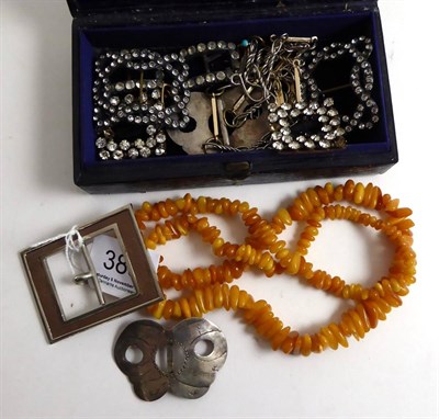 Lot 388 - An amber necklace, a 'cameo' brooch, a pair of earrings, Georgian paste set buckles, etc