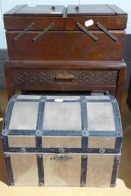 Lot 1036 - Oak folding work table on castors and contents and a dolls domed trunk (2)