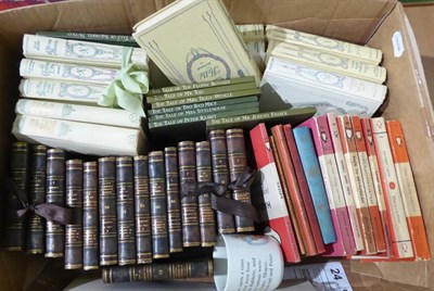 Lot 1055 - Assorted books and ephemera including eight Beatrix Potter books, fifteen leather bound volumes...