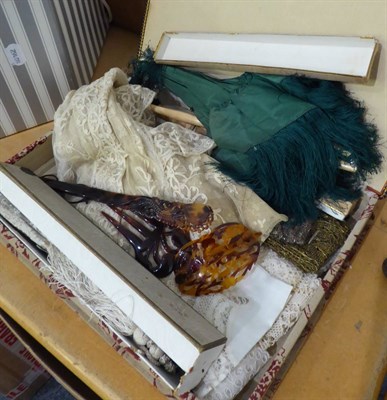 Lot 1063 - A late 19th century green silk folding parasol, embroidered lace stole, two fans (a.f.), lorgnette