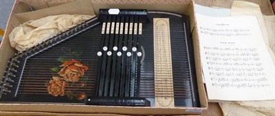 Lot 1085 - An early 20th century German autoharp, in original box, with music