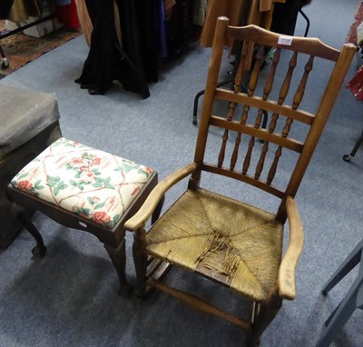 Lot 1128 - An early 19th century beech and ash rocking chair and a 19th century mahogany stool with ball...