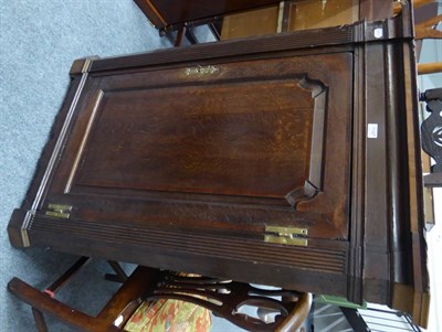 Lot 1147 - A George III oak wall hanging corner cupboard