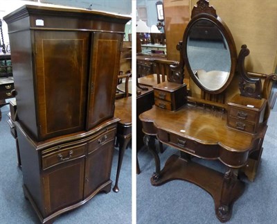 Lot 1152 - A reproduction bow fronted cabinet together with a Victorian mahogany dressing table