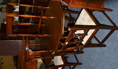 Lot 1154 - A set of four Ercol chairs, a Bevan & Funnell oak drop leaf table, walnut occasional table, oak...