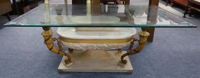 Lot 1156 - A composition period style glass top pedestal table decorated with swags and scrolls