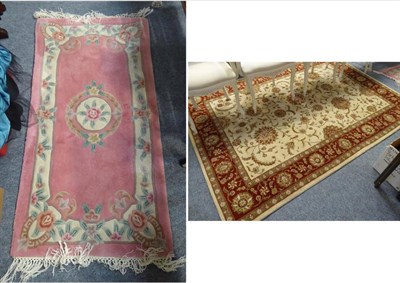 Lot 1191 - A Chinese superwash rug and Persian style wool rug