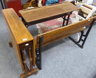 Lot 1192 - A pine school desk and a drop leaf table