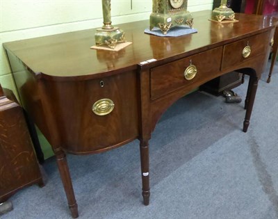 Lot 1249 - A George III mahogany breakfront sideboard