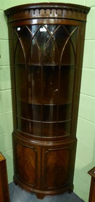 Lot 1259 - A reproduction mahogany corner cabinet