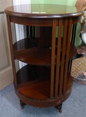 Lot 1264 - An inlaid mahogany circular revolving bookcase