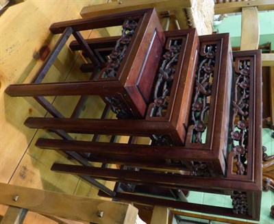 Lot 1268 - A nest of four Chinese hardwood tables