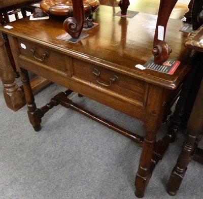 Lot 1283 - A George III provincial oak side table