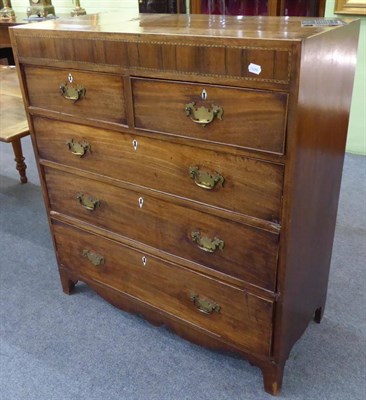 Lot 1293 - A George III inlaid four height chest of drawers