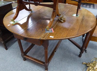 Lot 1315 - A 19th century oak gateleg dining table