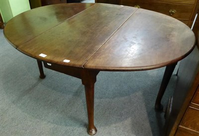 Lot 1319 - 19th century mahogany drop leaf dining table