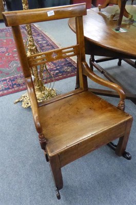 Lot 1324 - A 19th century country rocking chair with single drawer