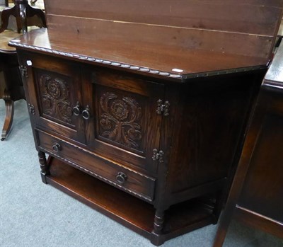 Lot 1334 - A Laycee oak cabinet