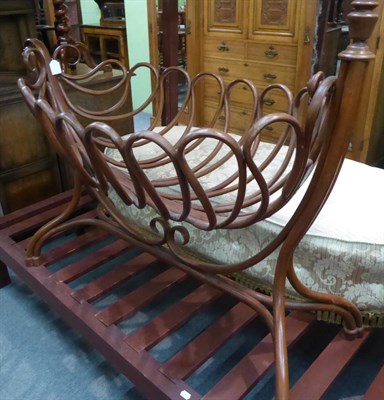 Lot 1336 - A Thonet bentwood cradle, circa 1890, 132cm wide