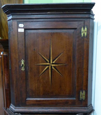 Lot 1343 - George III inlaid oak hanging corner cupboard (a.f.)