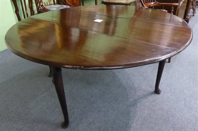 Lot 1360 - An early George III mahogany six-eight seater gateleg dining table, circa 1760, with rounded...