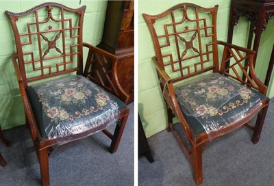 Lot 1367 - A pair of Chinese Chippendale style armchairs, with needlework drop in seats