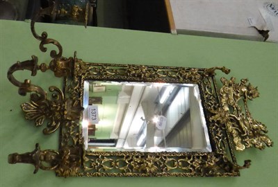 Lot 1373 - A 19th century brass three sconce hall mirror