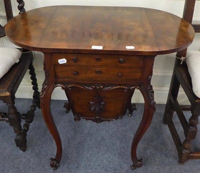 Lot 1376 - A 19th century rosewood work table with drop leaves