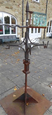 Lot 1378 - A weather vane, dated 1873 in a weathered copper panel