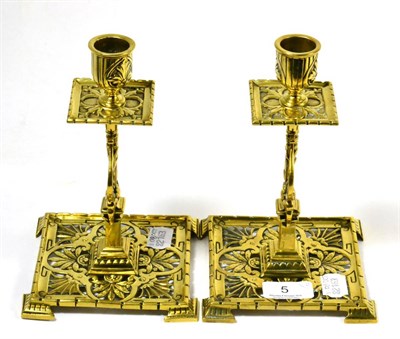 Lot 5 - A pair of Arts & Crafts brass candlesticks, stamped Townshend & Co