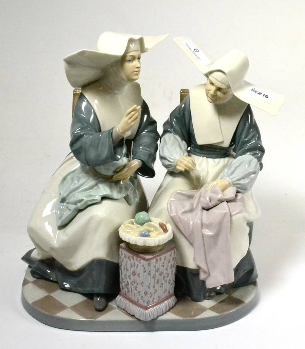 Lot 8 - Lladro porcelain group, two seated nuns in conversation