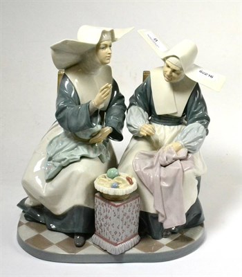 Lot 8 - Lladro porcelain group, two seated nuns in conversation