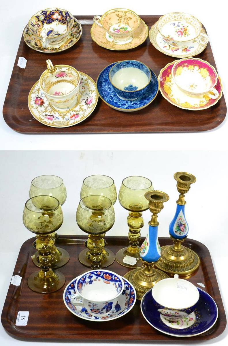 Lot 15 - Five etched wine glasses, pair of gilt metal porcelain candlesticks and eight tea cups and saucers