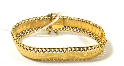 Lot 58 - Eastern gold articulated panel bracelet, probably 14ct