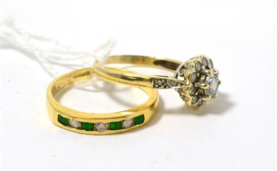 Lot 61 - An 18ct gold emerald and c/z seven stone ring and a 9ct gold c/z cluster ring (2)