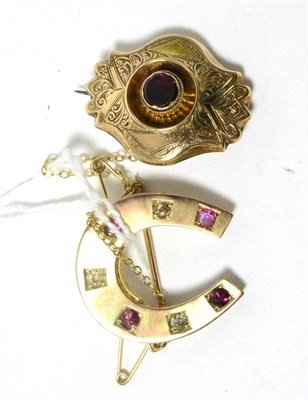 Lot 93 - A 15ct gold diamond and ruby horseshoe brooch and a gem-set hair locket brooch
